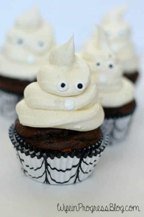 Chocolate cupcakes, frosted with eyes on top to look like ghosts