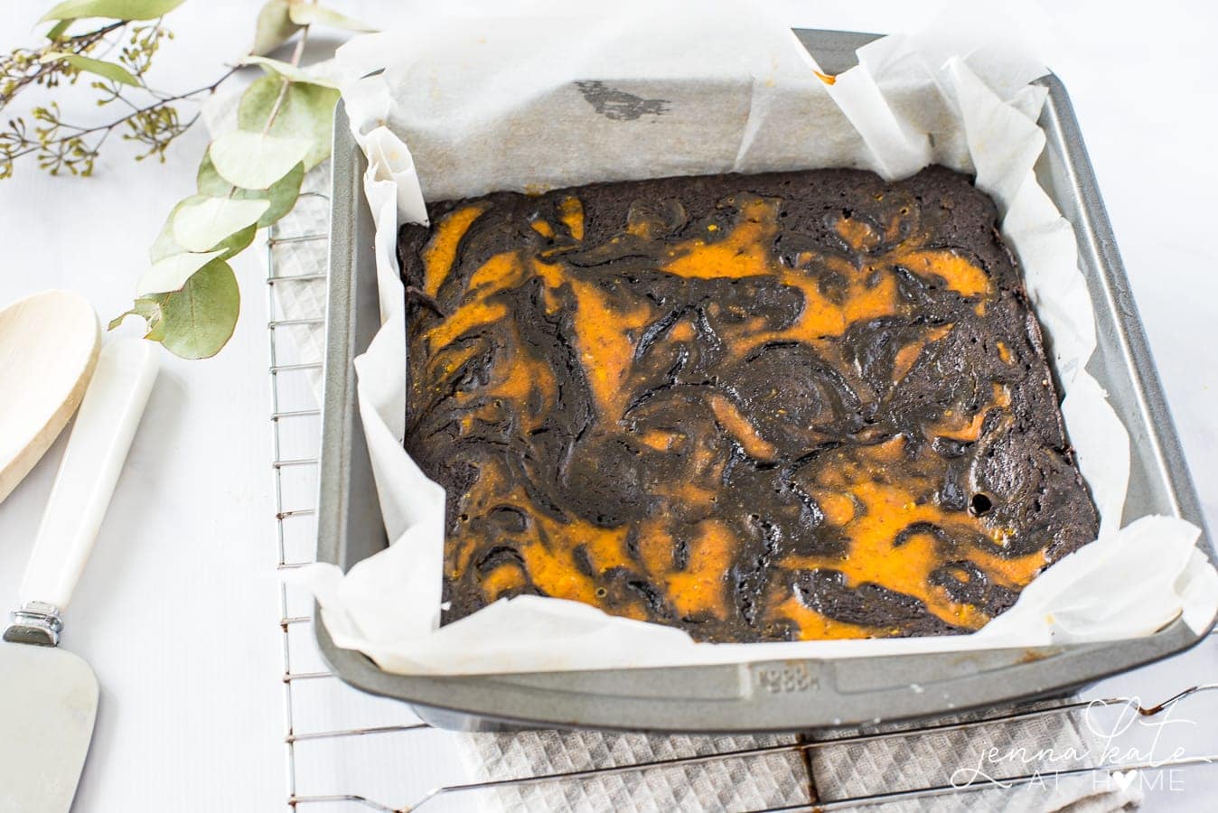 A decadent and fudgy chocolate brownie with a delicious spiced pumpkin swirl. It's the perfect fall dessert!