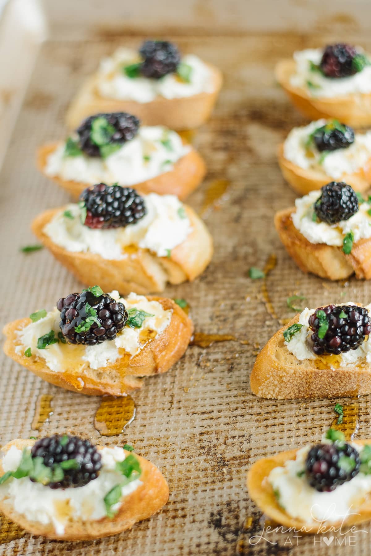 Honey drizzled over crostini appetizers