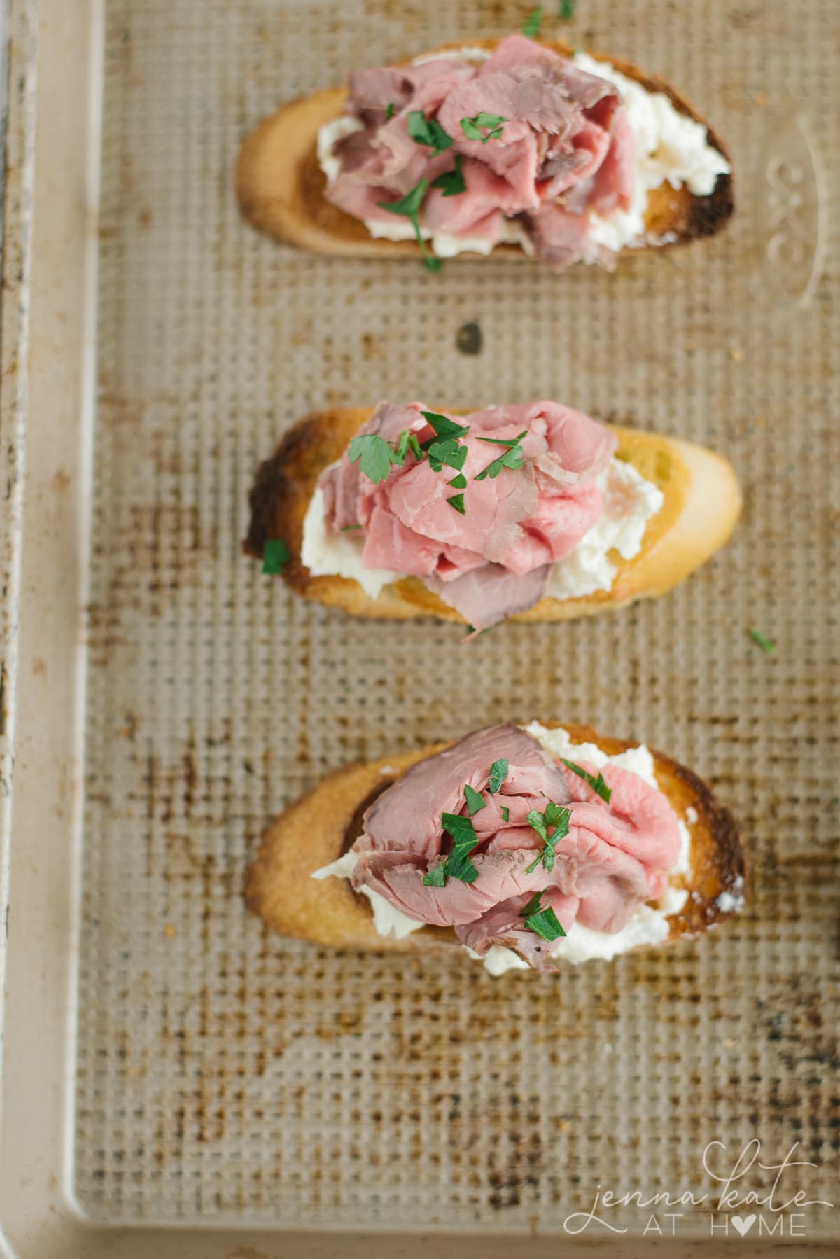 Easy holiday appetizer made with roast beef, cream cheese, horseradish and baguettes