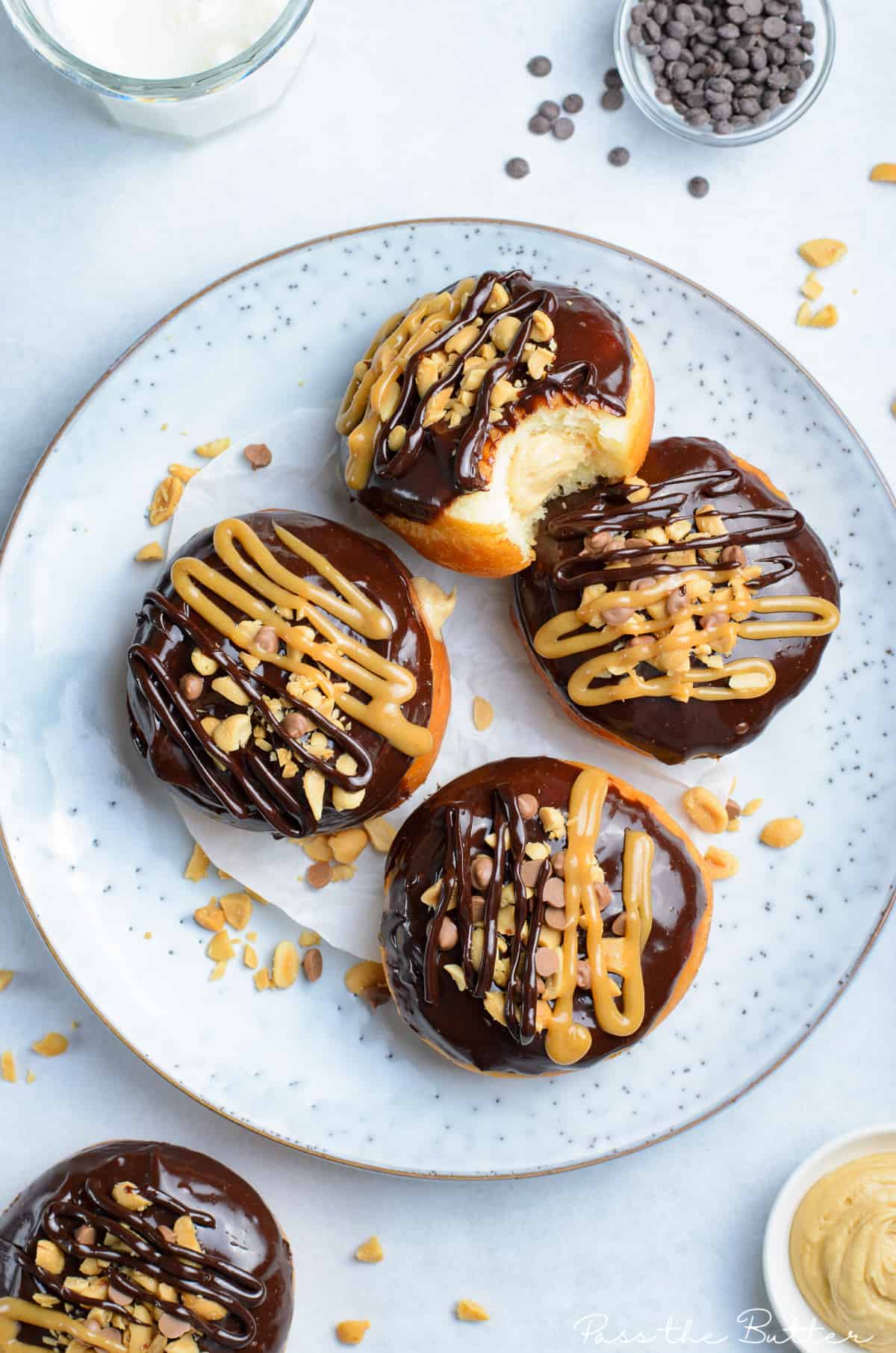 reeses peanut butter filled donuts ron a plate.