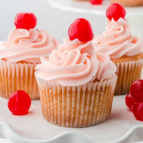 cherry cupcakes on a plate