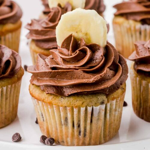 cupcake with chocolate buttercream frosting and banana on top