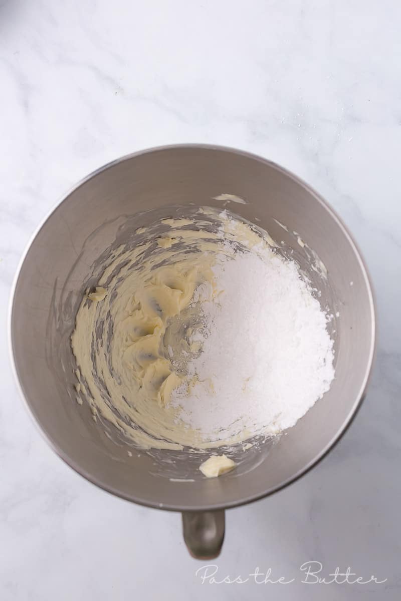 butter and powdered sugar in a mixing bowl