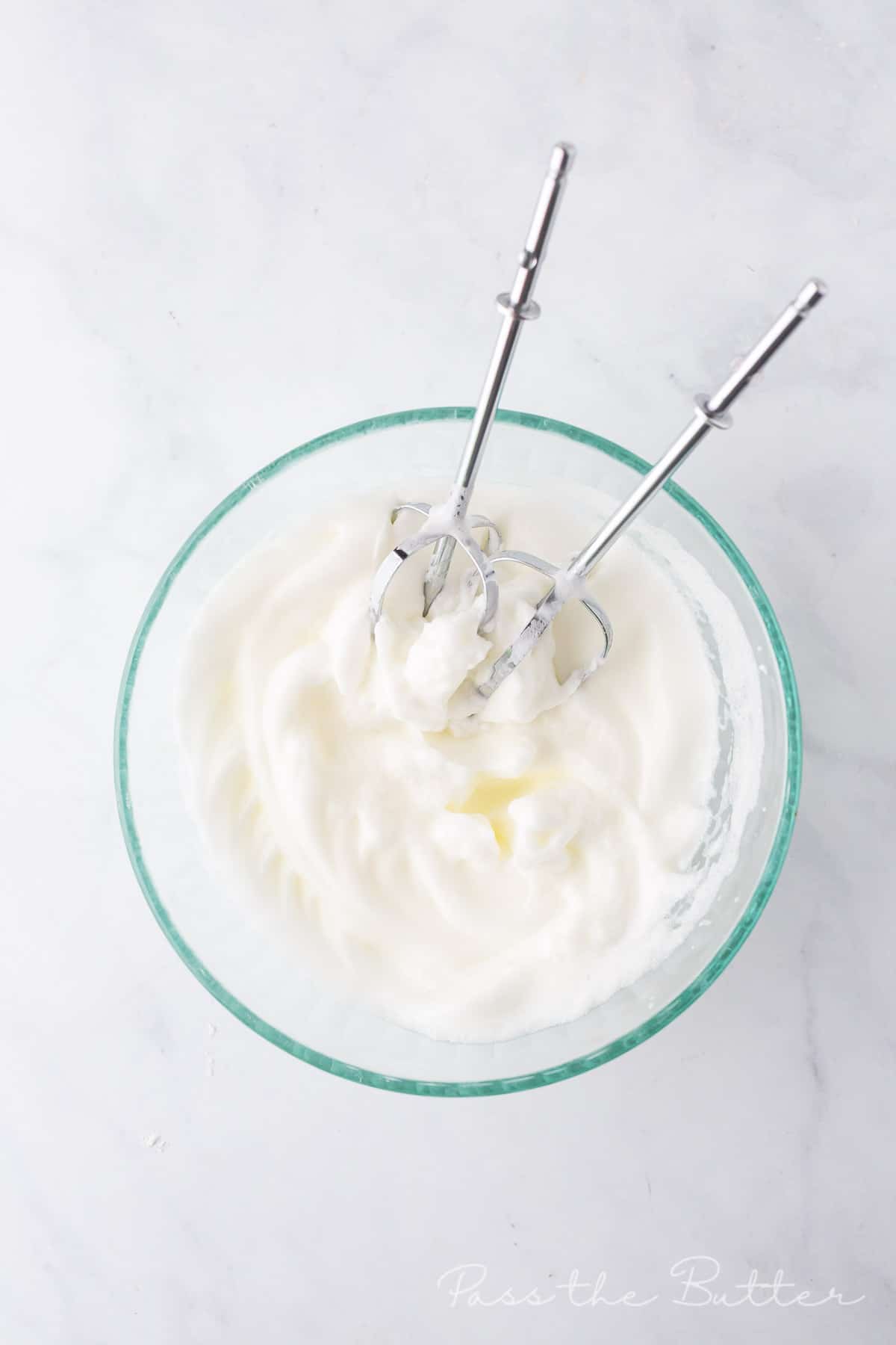 Whisk the egg whites until stiff peaks form