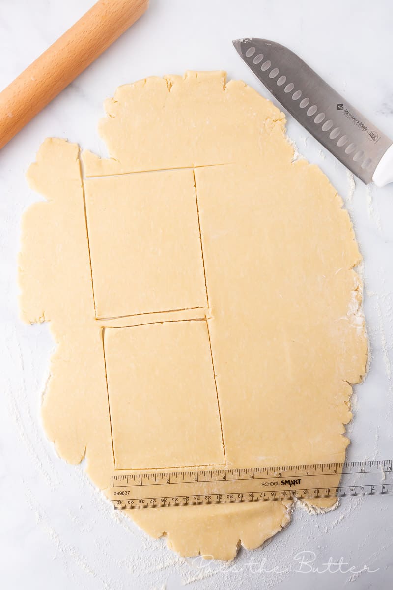 using a ruler to cut the correct size pastry dough