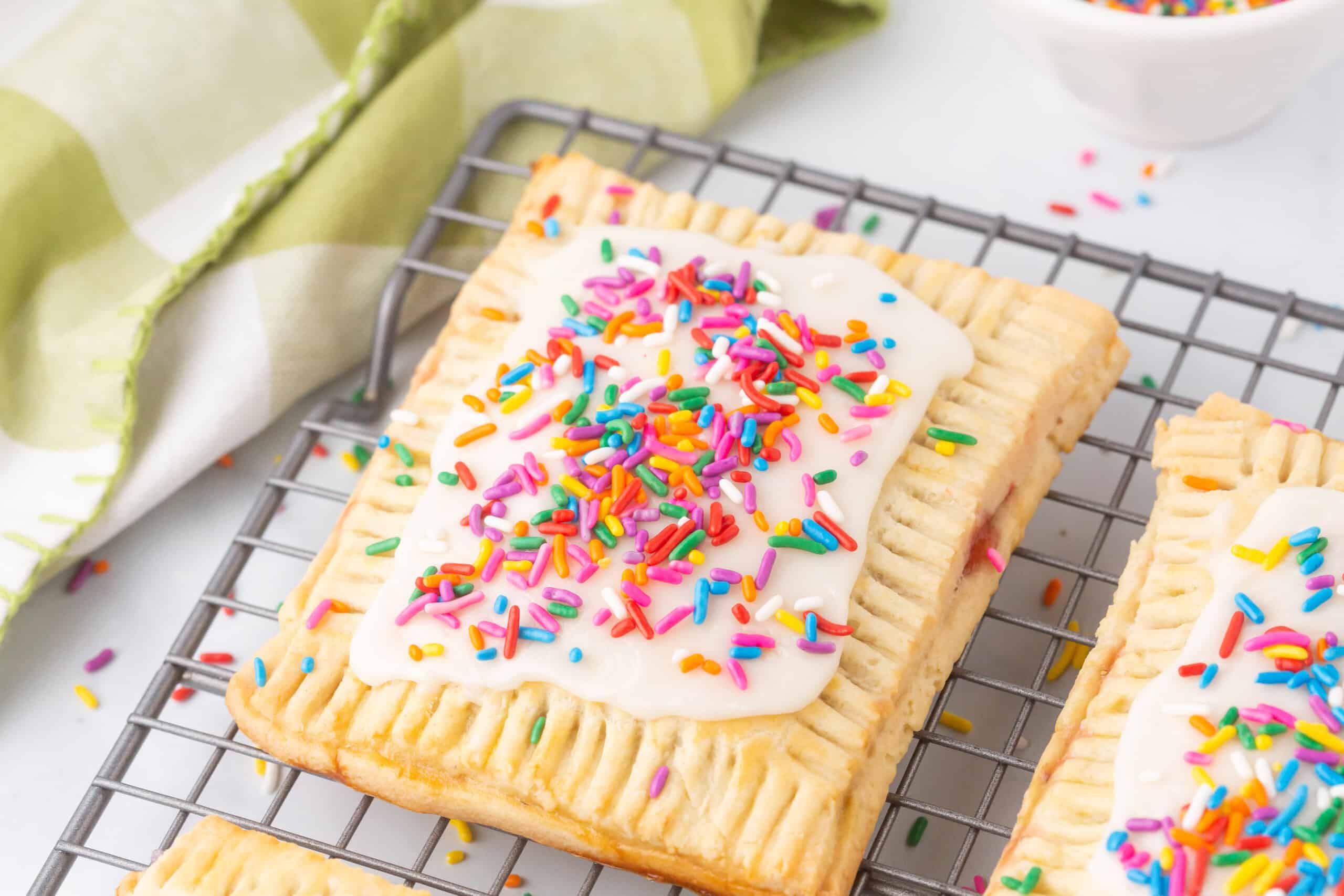 Strawberry Pop Tarts on a cooling rack.